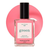 Vernis Manucurist Green Pop sur bouteille rose pastel, éclat longue tenue.