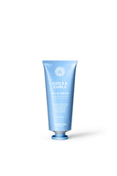 Maria Nila Coils & Curls Oil-In-Cream, bouteille prête pour des boucles hydratées.