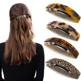 Barrette Markuii grande en acétate tortue, look élégant et sûr.
