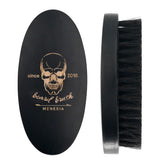 La brosse Menesia barbe bois noir compacte et portable pour voyage.