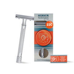 Rasoir MERKUR 22C et poignee longue nervuree en laiton, prise stable.