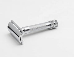 Rasoir Merkur 34C - ouverture par torsion pour changement de lame rapide.