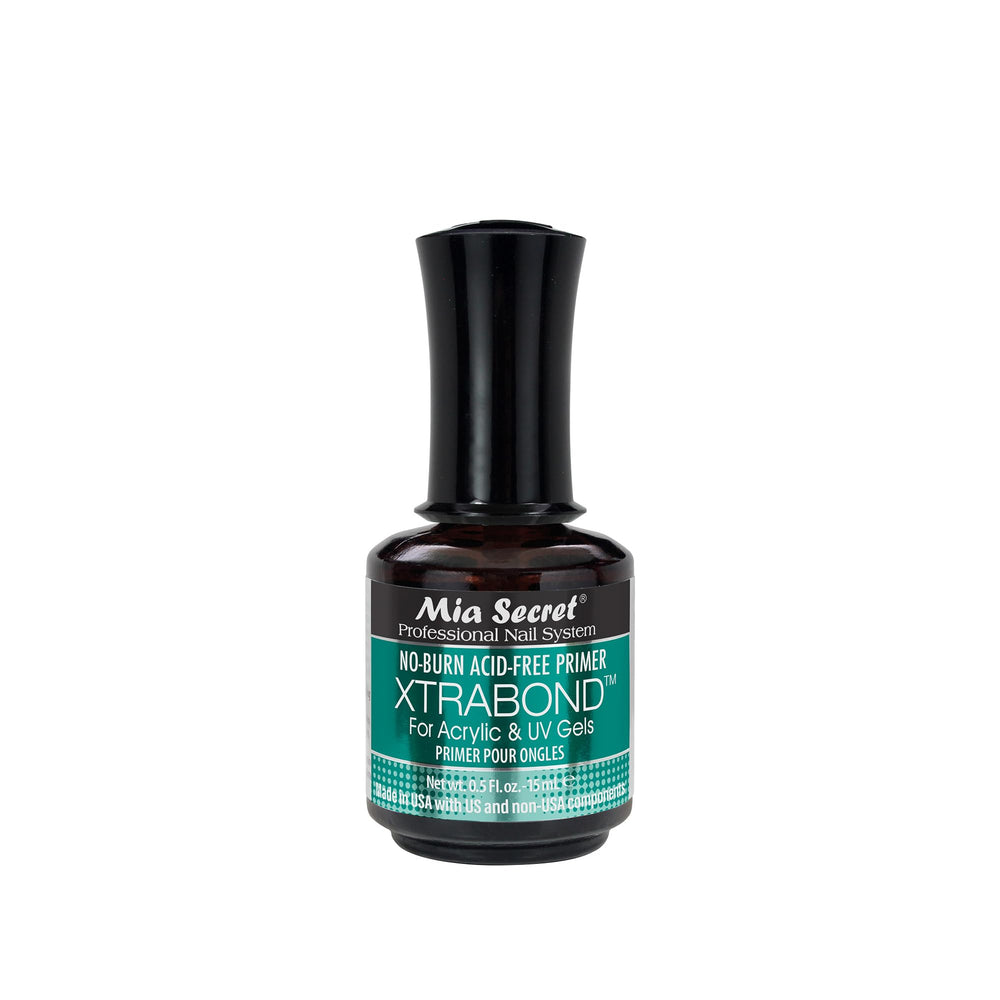 Bouteille Mia Secret Xtrabond, base sans acide pour adhérence maîtrisée.
