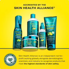 Mielle Weightless Hair Oil being applied to hair to seal moisture and reduce frizz.