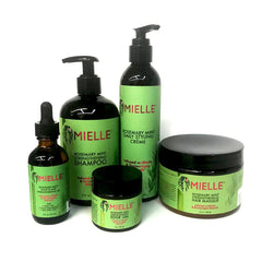 Shampoing Romarin Menthe de Mielle Organics, bouteille, nettoie et revitalise les cheveux.