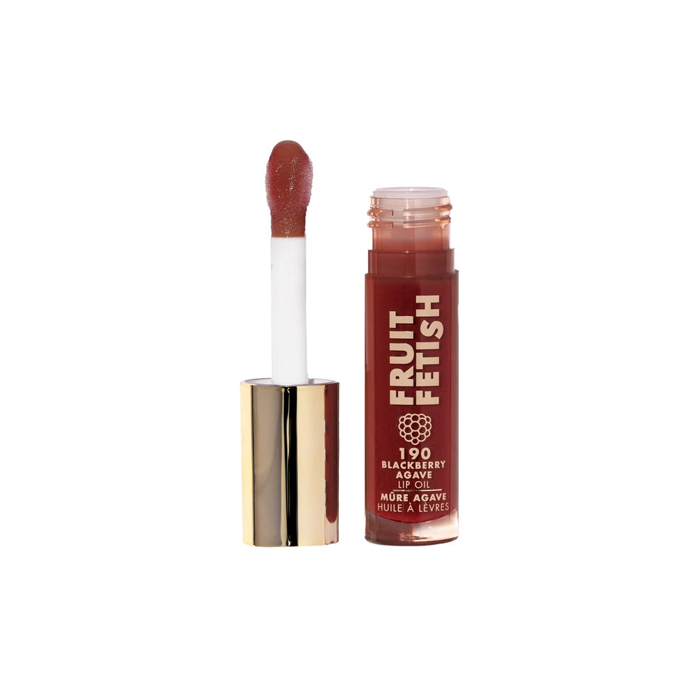 Milani Fruit Fetish Huile Levres Bouteille : hydratation instantanée et brillance légère.