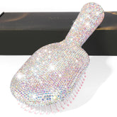 Brosse Minovel palette diamant-cristal pour démêlage en douceur et glamour.