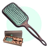 Brosse Mint paddle avec poignée bois frene pour detanglage en douceur.