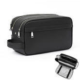Sac de toilette MIRASON en cuir noir prêt pour le voyage et l'organisation.