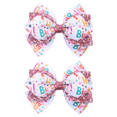 Broche cheveux Miroksh avec noeud ruban anniversaire rose pailleté, parfait pour fête.