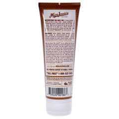 Miss Jessie's émulsion au miel pour boucles, application homogène et couverture optimale.