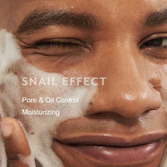 MIZON Snail Repairing Foam Cleanser close-up showing creamy lather for pores.