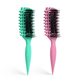 Brosse Candybrush de MMBVSZ pour définir les boucles et démêler les nœuds.