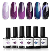 Modelones Gel Cat Eye rouge-violet, effet scintillant pour une manucure élégante.