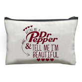 Pochette MONNYCAR Dr Pepper humour, design coloré et double-face pour le maquillage.