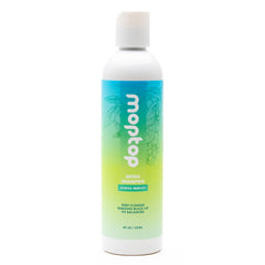 MopTop Detox Shampoo – bouteille agrumes prête à clarifier le cuir chevelu.