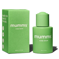 Mumms Serum : bouteille verte prête à nourrir le cuir chevelu.