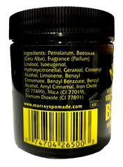 Closeup of Murray's Black Beeswax label, color tint adds depth and shine