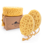 myHomeBody éponge de bain grande et ovale offrant une prise en main confortable et une mousse généreuse.