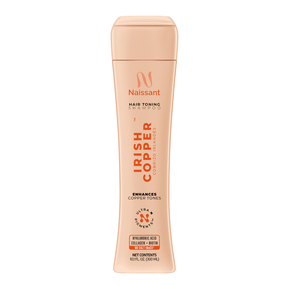 Shampoing Naissant Cuivre Irlandais en bouteille, couleur cuivre éclatante.