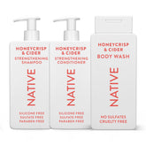 Native shampoing et après-shampoing Honey Crisp & Cider, bouteilles visibles pour cheveux plus forts.