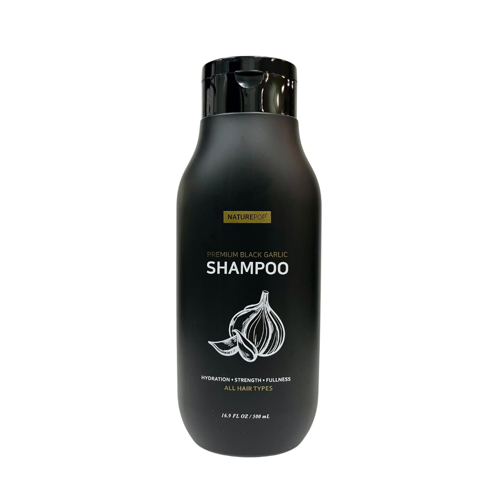 Naturepop Shampoing ail noir – bouteille élégante pour routine capillaire potentielle.