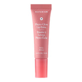 Naturium Phyto-Glow Baume Lèvres en application, hydratation longue durée.