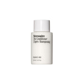Nécessaire The Conditioner Mini – bouteille hyaluronique, démêlage doux et hydratant.