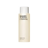 Nécessaire The Shampoo: bouteille recto, soin quotidien doux pour cuir chevelu sensible.