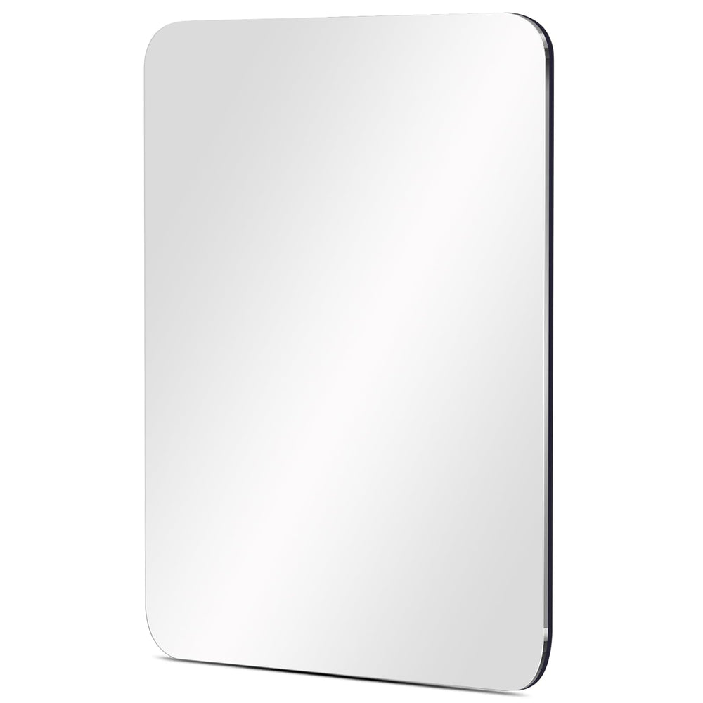 Miroir Neehows magnétique fixé sur placard pour vérification rapide.