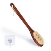 Brosse NENO CICI avec poignée longue en bois pour atteindre le dos.