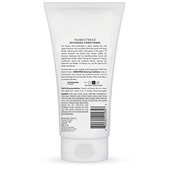 Application du conditionneur Nexxus Humectress sur cheveux mouillés pour douceur.