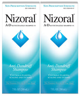 Shampoing anti-pelliculaire Nizoral A-D en bouteille bleue, action ciblée contre les pellicules.