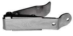 No-mes prise-ergonomique-patentee: prise stabile et confortable pendant la coupe.