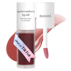 NOONI Applecranberry huile à lèvres : bouteille élégante pour une hydratation durable.