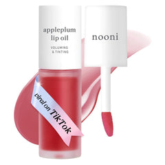 NOONI Appleplum huile lèvres, bouteille élégante prête pour une hydratation rapide.