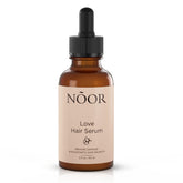 NOOR HAIR sérum olives africaines dans une bouteille, soin capillaire nourrissant.