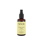 NOOR HAIR Wonder Growth Spray: bouteille élégante prête pour une utilisation quotidienne.