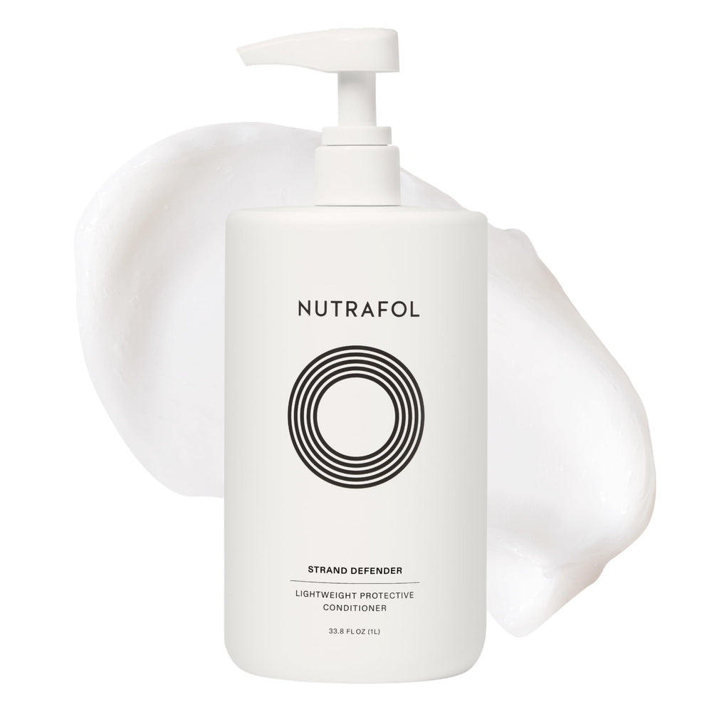 Nutrafol Conditionneur sur la bouteille d’1 L, hydratation durable pour cheveux clairsemés.