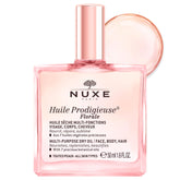 Nuxe Huile Prodigieuse Floral, bouteille lumineuse prête à hydrater visage et corps.