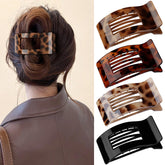 Pinces plates Oeusnae en motif tortue pour un maintien fiable des cheveux épais.