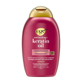 OGX Anti-Casse: flacon de conditionneur à la kératine et huile d’argan.