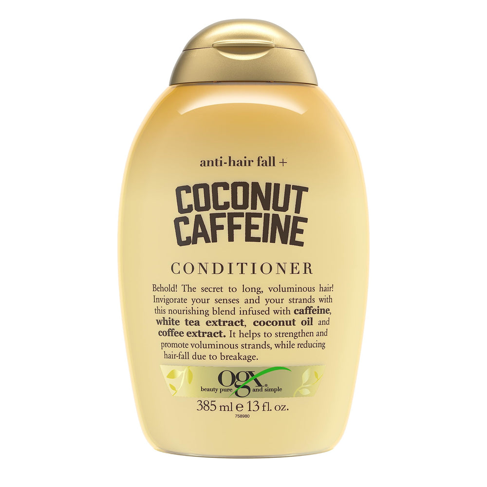 OGX Anti-Chute Caféine Coco — bouteille prête pour revitaliser les cheveux.