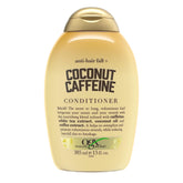 OGX Anti-Chute Caféine Coco — bouteille prête pour revitaliser les cheveux.