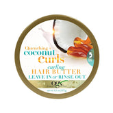 OGX Boucles Coco – bouteille; boucles hydratées et définies après application.