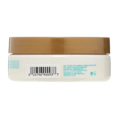 OGX Boucles Coco – texture crèmeuse facilitant l’application sur cheveux bouclés.