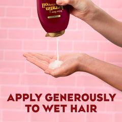 OGX formula image with keratin, argan oil, and ceramides