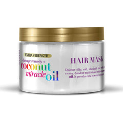 OGX Remède anti-dommages huile miraculeuse de coco pour nourrir et apporter de la brillance.