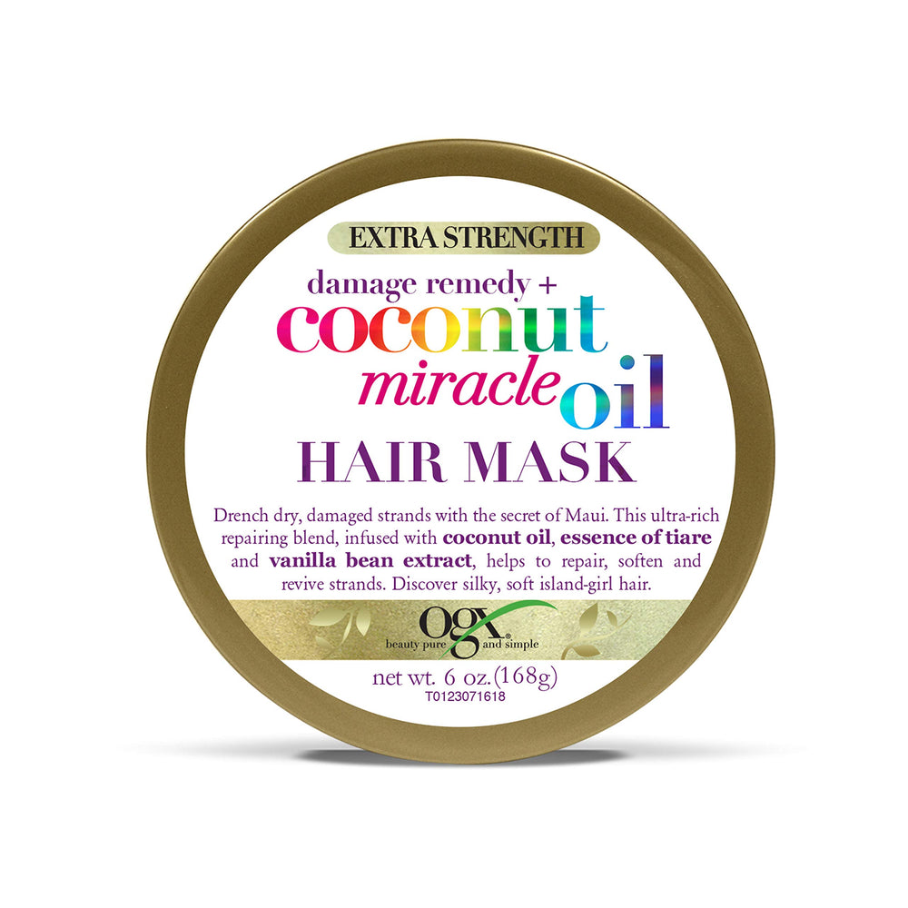 OGX Remède anti-dommages masque coco-cheveux épais pour douceur et réparation.