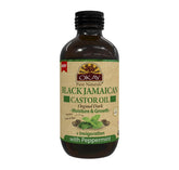 OKAY Pure Naturals: bouteille en verre d'huile ricin noire jamaïcaine prête à usage capillaire.